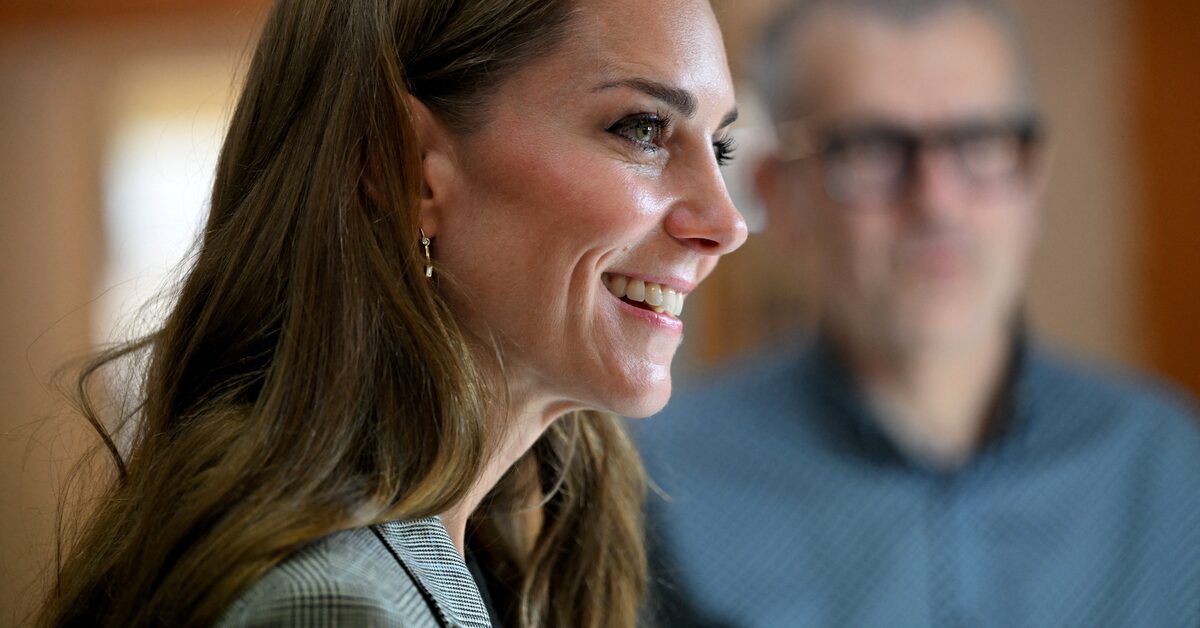 Princess Kate smiling during a public appearance while speaking about family and technology concerns